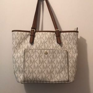 MK cream colored purse